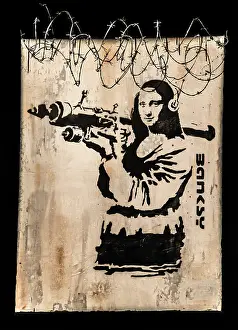 Banksy - Mona Lisa Bazooka, Icon armed with rocket launcher as a critique of war
