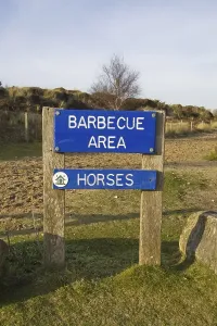 Barbecue Area and Horses direction sign