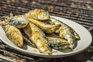 Barbecued sardines, traditional Portuguese food