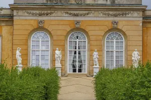Baroque building with white statues