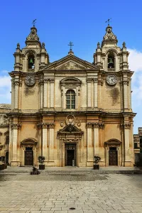 Baroque facade with clocks for time and date