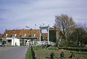 Bascule bridge and traditional village houses in Marken, Netherlands, 1973