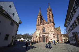 Basel, Switzerland, March 10, 2019: Basel Minster with people in front of it