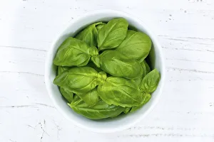 Basil herbs from above wooden board