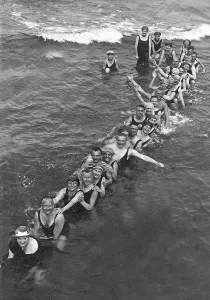 Bathing group on the beach, funny