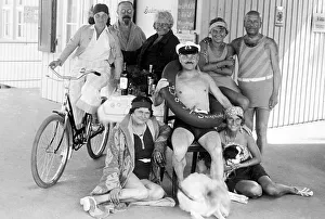 Bathing group on the beach, funny