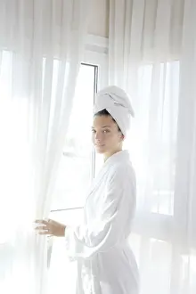Category Historic EN Prints: Bathrobe happy woman sunny hotel window white curtains