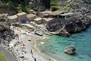 Beach and houses in the bay of Cala de Deia