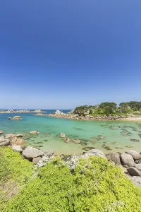 Beach with rocks and sand at the Plage Saint Guirec