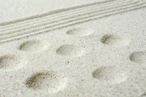 Beach sand with lines and circles