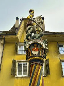 The Beautiful Baroque Old Town and a Fountain Statue in a Sunny Autumn Day in Solothurn
