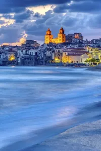 Beautiful Cefalu on the north coast of Sicily in front of sunrise