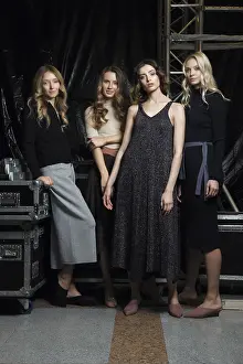Four beautiful girls in knitted clothes