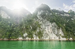 Beautiful green river and mountains in Ratchaprapha Dam