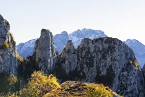 Beautiful landscape of the layered misty hazy Italian Alps mountain range during evening