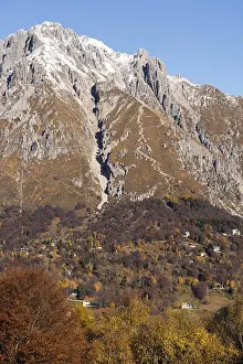 Beautiful landscape of the layered misty hazy Italian Alps mountain range during evening