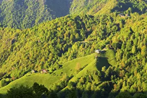 Beautiful landscape of the layered misty hazy Italian Alps mountain range during evening