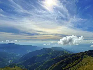 Beautiful Mountainscape with Cloudscape and Sunlight in a Sunny Day in Monte Generoso