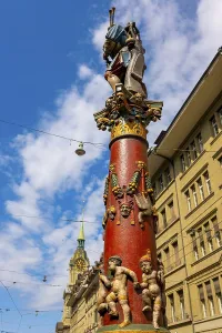 Beautiful Old City with Old Building and Statue and Church Tower in a Sunny Summer Day in City of Bern
