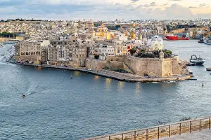 Beautiful sunset view of Valletta city with Saint Angelo Fortress