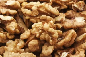 Beautiful tasty walnat kernels making organic background