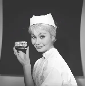 Beauty care in the 1950s. A young woman is holding a package of soap named Neutrogena