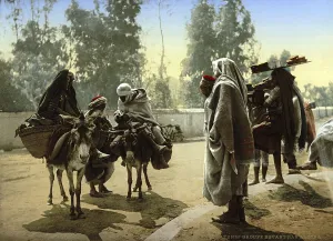 Bedouins with donkeys, group in front of the Bab Aleona