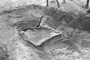 Beggar buried under sand only hands showing Chowpatty Mumbai India Asia 1974