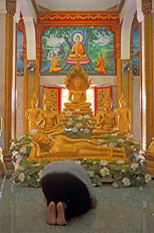 Believer praying, Wat Chalong monastery