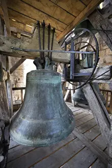 Bell in the bell tower of Saint-Pierre de Brantome Benedictine Abbey on the Dronne River