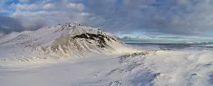 Berserkjahraun, snow covered lava field with crater