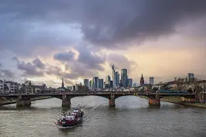 A big city in the evening at sunset