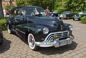 Black classic vintage car with chrome details
