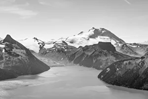 Black and white, Garibaldi Lake in front of mountain range with snow and glacier