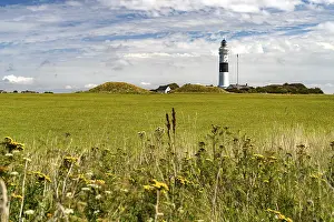 The black and white Langer Christian lighthouse near Kampen