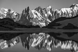 Black and white, mountain panorama with water reflection in Lac Blanc