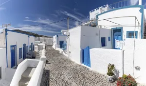 Blue doors, white buildings, panoramic view