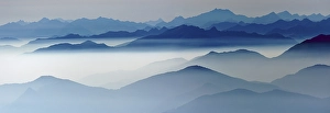 Category Mountain Landscapes Prints: Blue graded mountain ranges in backlight