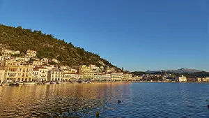 The blue hour brings peace to the coastal landscape and is reflected in the calm sea