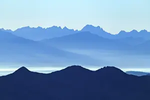 Blue hour over South Tyrolean mountains with haze in the valley