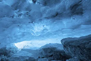 Blue ice mixed with volcanic ash in ice cave inside Breidamerkurjokull