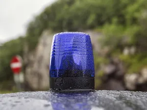 Blue light on a car roof, police patrol car