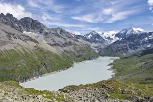 Blue mountain lake in a mountain landscape with glaciers
