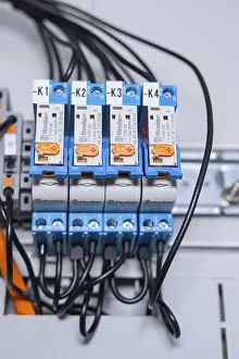 Category Historic EN Prints: Four blue relays connected in series