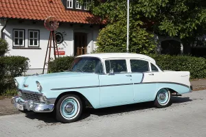 Blue vintage car Chevrolet Bel Air parked on the street