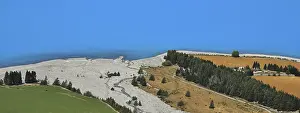 Blue water of Lake Pukaki. River delta and rural landscape