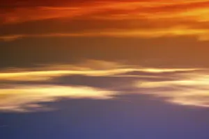 The blurred and abstract clouds and colours of a sunset