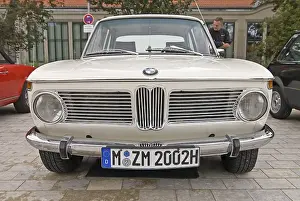 Front of BMW 2002 with special number plate for vintage cars