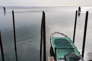 Boat, jetty on the lagoon, Burano