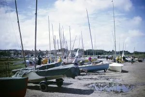 Boats on the beach and in the village of Brancaster, Norfolk, England 1966